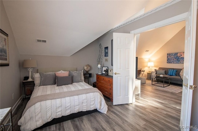 2810 Winterfield Rd, Midlothian, VA 23113 - bedroom featuring vaulted ceiling and wood finished floors
