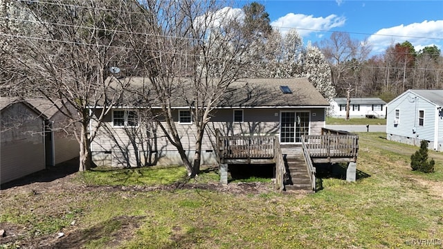 1090 Dry Bread Rd, Emporia, VA 23847 - rear view of house with crawl space, a wooden deck, and a yard