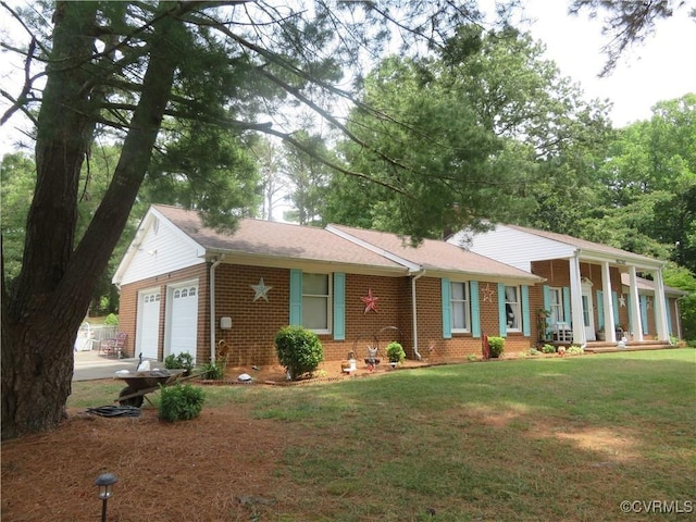 9616 Sunnyside Rd, Mc Kenney, VA 23872 - ranch-style house featuring an attached garage, a front yard, brick siding, roof with shingles, and covered porch
