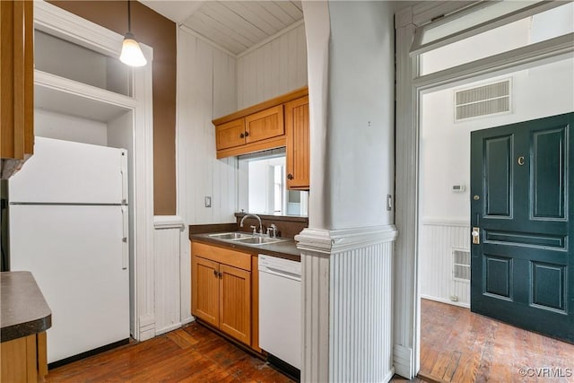 2200 E Grace St, Richmond, VA 23223 - kitchen featuring dark countertops, white appliances, a sink, and dark wood-style floors