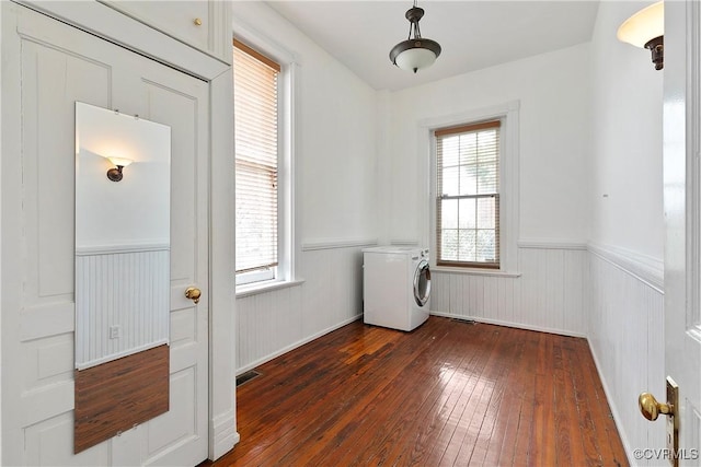2200 E Grace St, Richmond, VA 23223 - clothes washing area featuring wainscoting, a wealth of natural light, washer / clothes dryer, dark wood-style flooring, and laundry area