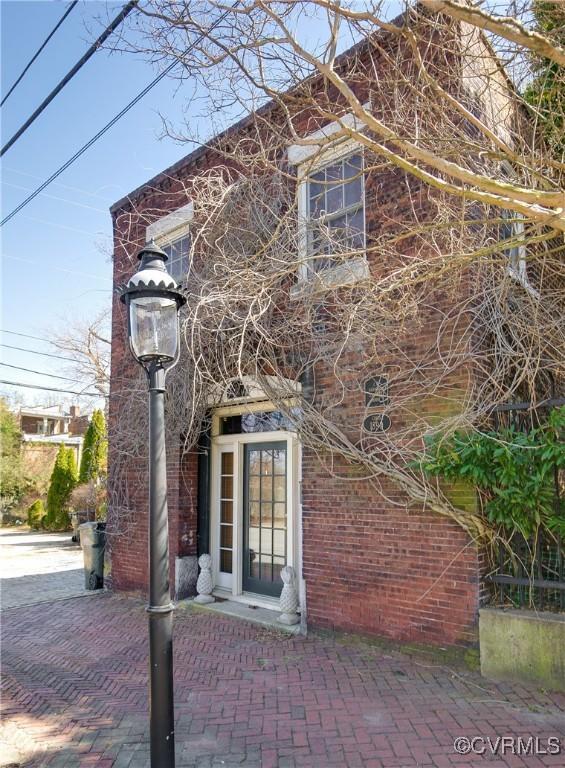 2200 E Grace St, Richmond, VA 23223 - view of side of home featuring brick siding