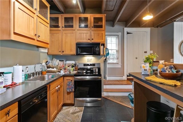 2200 E Grace St, Richmond, VA 23223 - kitchen with beamed ceiling, dark countertops, a sink, and black appliances