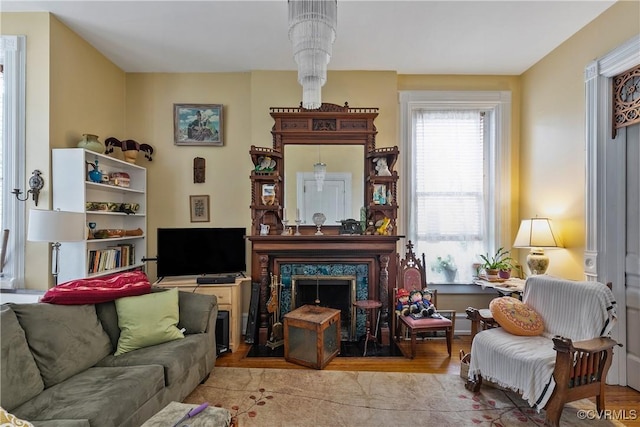 2200 E Grace St, Richmond, VA 23223 - living room featuring a premium fireplace and wood finished floors