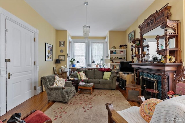 2200 E Grace St, Richmond, VA 23223 - living room featuring a high end fireplace and wood finished floors