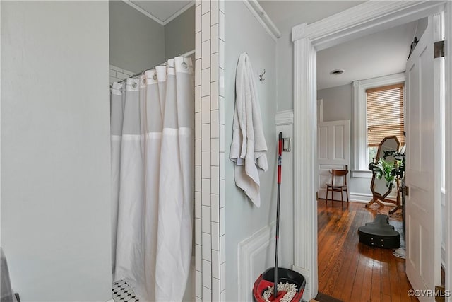 2200 E Grace St, Richmond, VA 23223 - full bath with wood-type flooring, ornamental molding, and a shower with curtain
