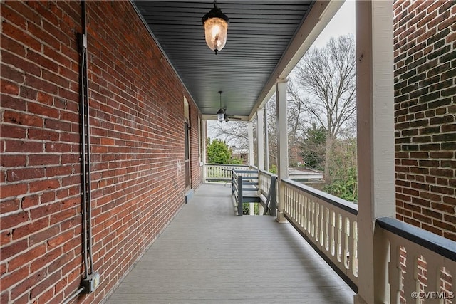 2200 E Grace St, Richmond, VA 23223 - wooden deck featuring covered porch