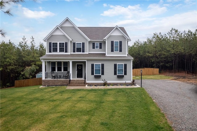 7324 Bailie Dr, Mechanicsville, VA 23111 - traditional-style home with fence, a front lawn, a porch, and roof with shingles
