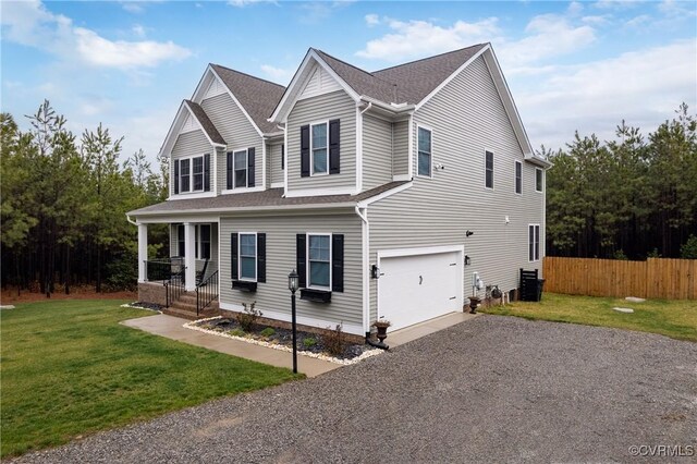 7324 Bailie Dr, Mechanicsville, VA 23111 - view of front of house with driveway, a garage, fence, and a front lawn