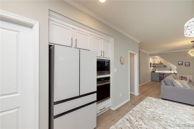 7324 Bailie Dr, Mechanicsville, VA 23111 - kitchen featuring open floor plan, white cabinetry, light wood-style floors, and appliances with stainless steel finishes