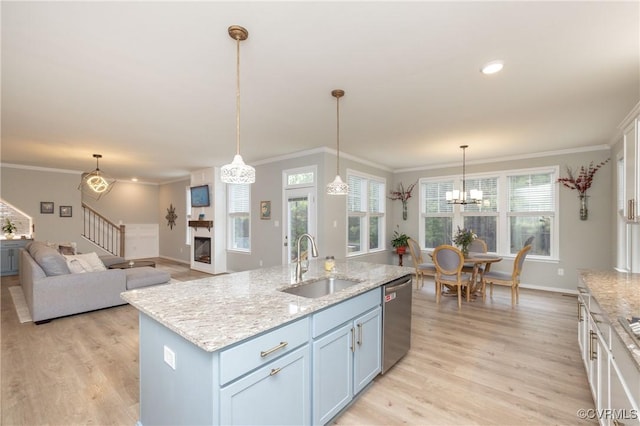 7324 Bailie Dr, Mechanicsville, VA 23111 - kitchen featuring light wood finished floors, ornamental molding, a sink, and dishwasher