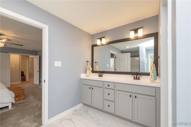7324 Bailie Dr, Mechanicsville, VA 23111 - bathroom featuring marble finish floor, baseboards, ceiling fan, and a sink
