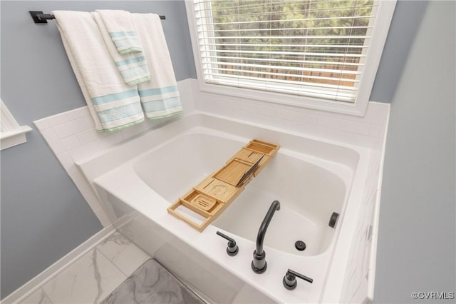 7324 Bailie Dr, Mechanicsville, VA 23111 - bathroom with marble finish floor and a garden tub