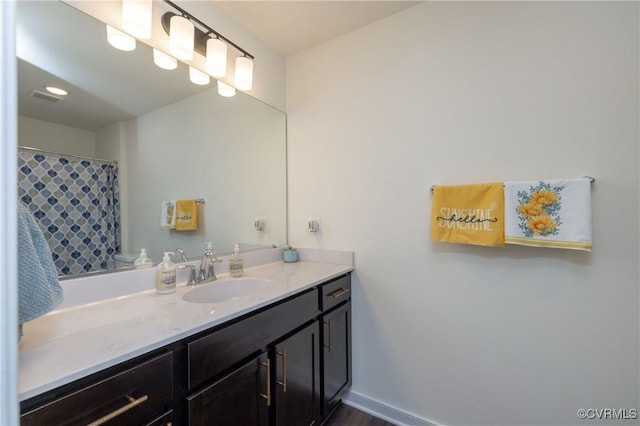 7324 Bailie Dr, Mechanicsville, VA 23111 - bathroom featuring vanity, baseboards, and visible vents