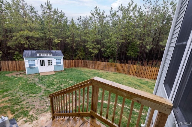 7324 Bailie Dr, Mechanicsville, VA 23111 - view of yard with an outdoor structure, a fenced backyard, and a storage unit
