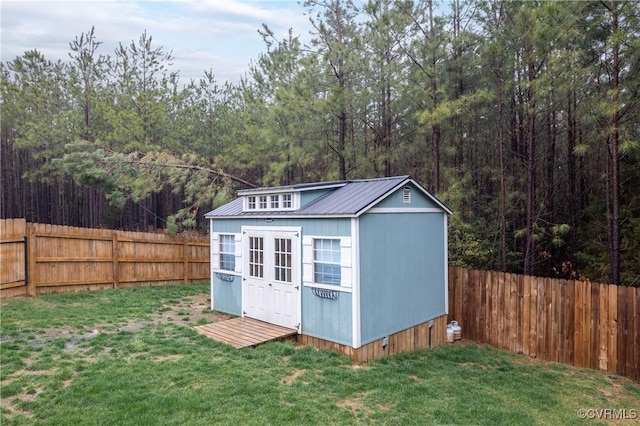7324 Bailie Dr, Mechanicsville, VA 23111 - view of shed featuring a wooded view and a fenced backyard