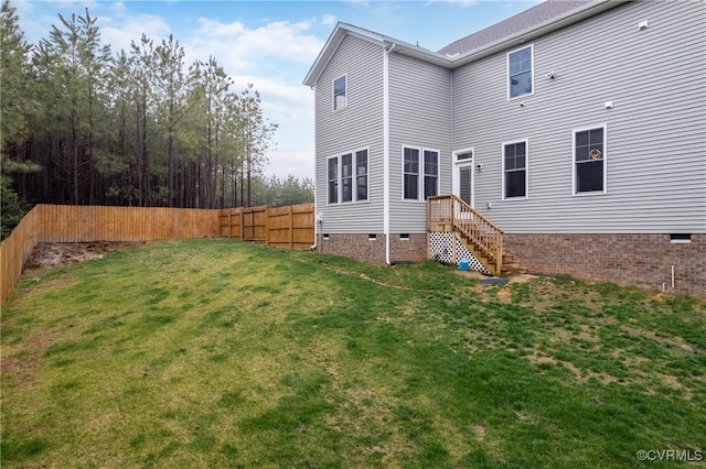 7324 Bailie Dr, Mechanicsville, VA 23111 - rear view of house featuring fence, crawl space, and a yard