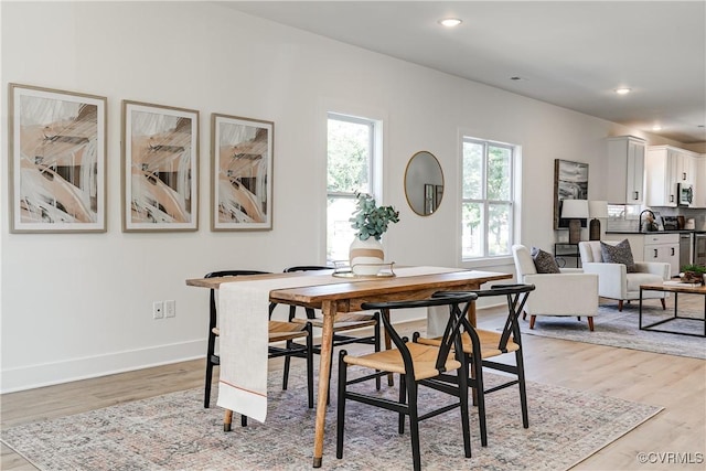 8031 Lake Shore Dr, North Chesterfield, VA 23235 - dining room with baseboards, light wood finished floors, and recessed lighting
