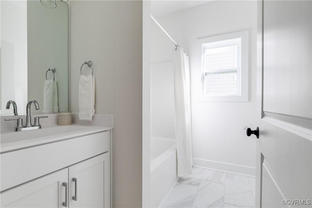 8031 Lake Shore Dr, North Chesterfield, VA 23235 - full bath featuring marble finish floor, vanity, shower / bathtub combination with curtain, and baseboards