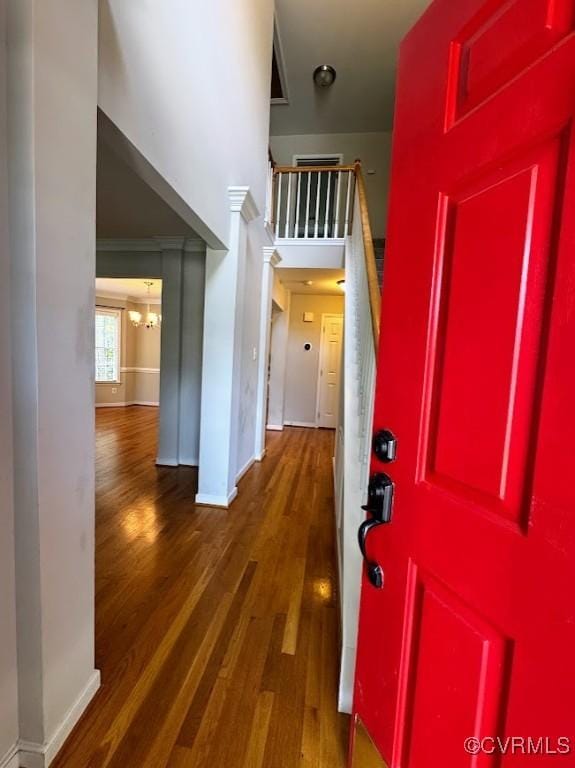 14312 Ashdale Way, Chesterfield, VA 23832 - foyer featuring wood finished floors, a towering ceiling, a chandelier, and baseboards
