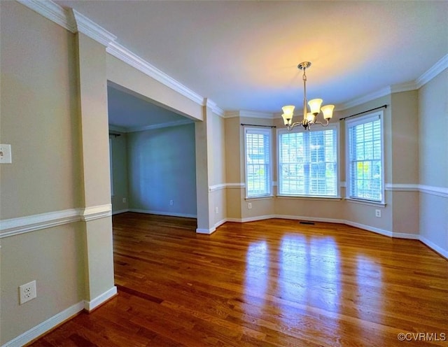 14312 Ashdale Way, Chesterfield, VA 23832 - spare room with healthy amount of natural light, a chandelier, wood finished floors, baseboards, and crown molding