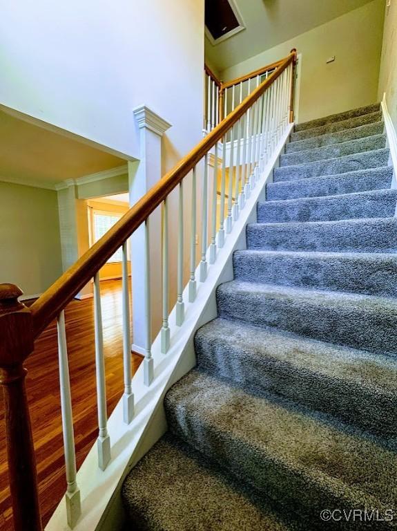14312 Ashdale Way, Chesterfield, VA 23832 - stairs with ornamental molding, wood finished floors, and decorative columns