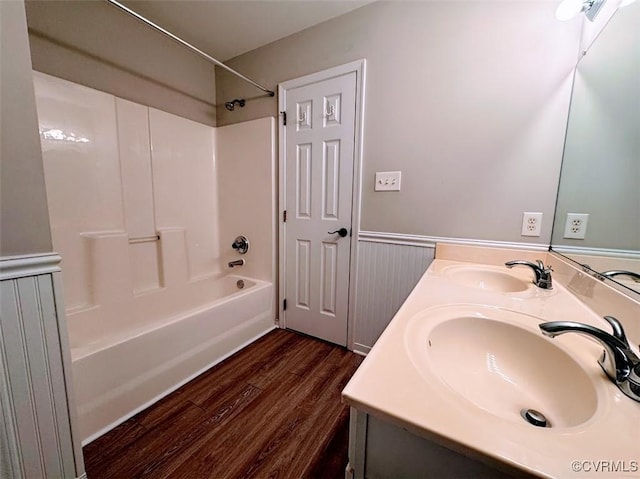 14312 Ashdale Way, Chesterfield, VA 23832 - full bathroom with shower / tub combination, wood finished floors, a wainscoted wall, and double vanity