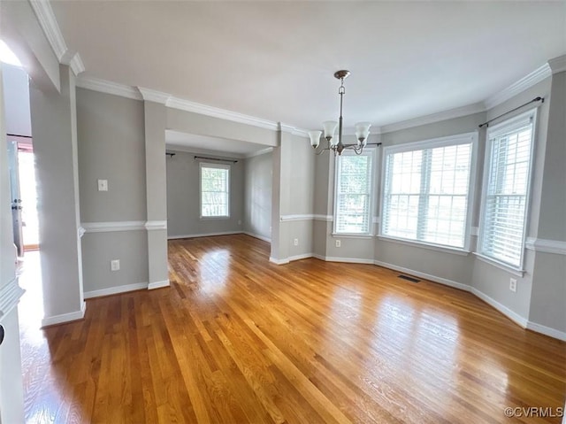 14312 Ashdale Way, Chesterfield, VA 23832 - empty room with a chandelier, light wood-style flooring, and crown molding
