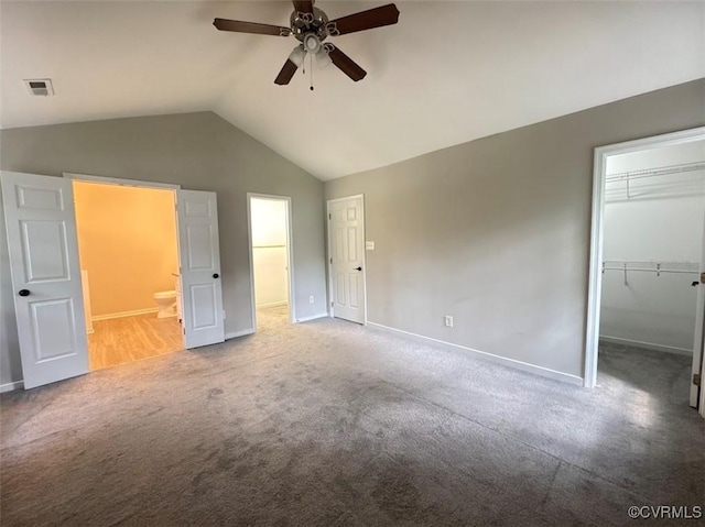 14312 Ashdale Way, Chesterfield, VA 23832 - unfurnished bedroom with a spacious closet, carpet flooring, vaulted ceiling, connected bathroom, and a closet