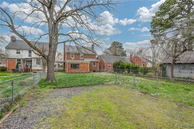 view of yard featuring a gate and fence private yard
