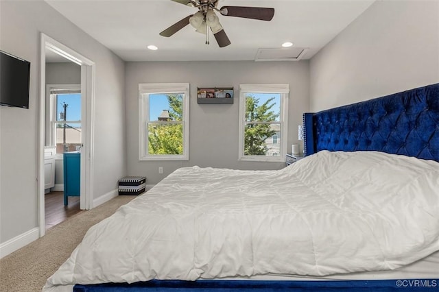 bedroom featuring ceiling fan, carpet floors, attic access, recessed lighting, and baseboards