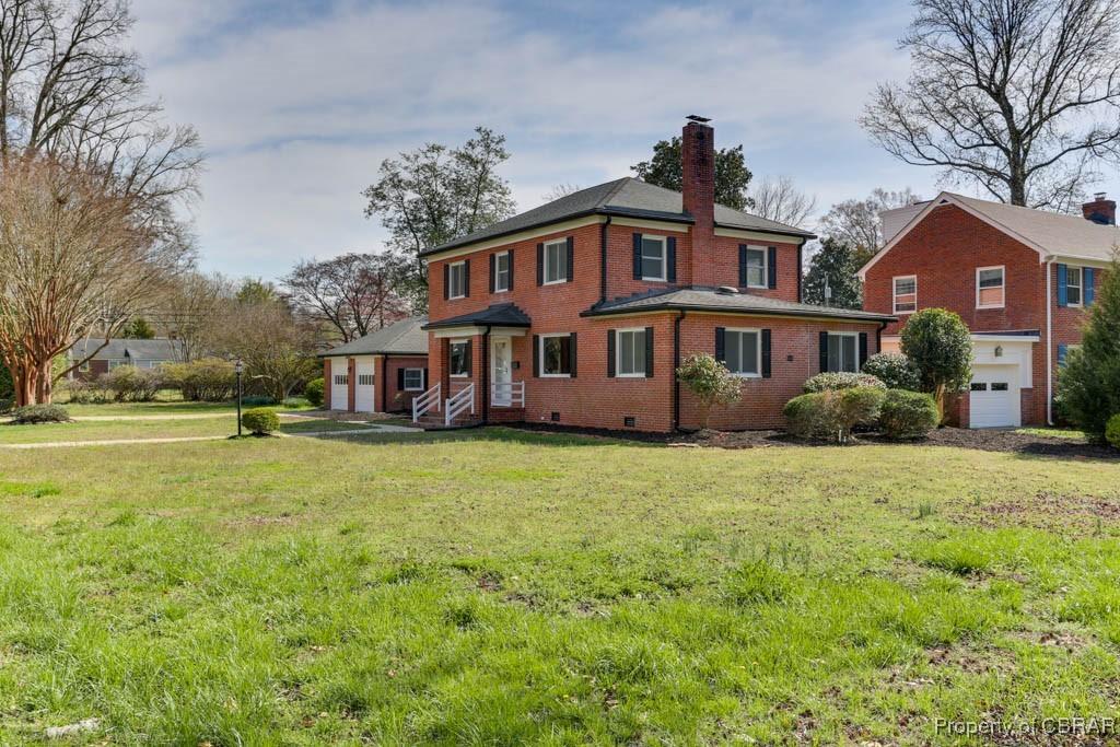 36 Cedar Ln, Newport News, VA 23601 - view of front of house featuring crawl space, a front lawn, brick siding, a garage, and a chimney