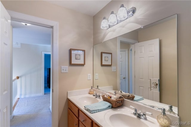 13494 Lakeview Farms Pl, Ashland, VA 23005 - bathroom featuring double vanity, baseboards, and a sink