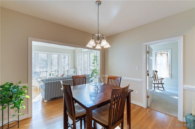 13494 Lakeview Farms Pl, Ashland, VA 23005 - dining space with light wood finished floors, baseboards, and a chandelier