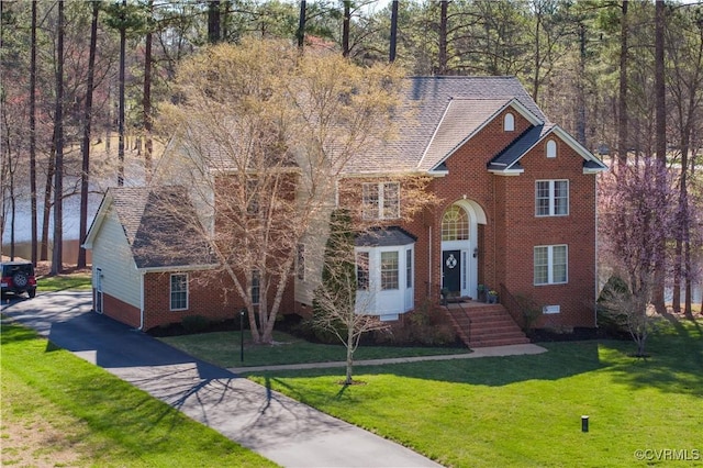 13494 Lakeview Farms Pl, Ashland, VA 23005 - view of front facade with brick siding, crawl space, and a front yard