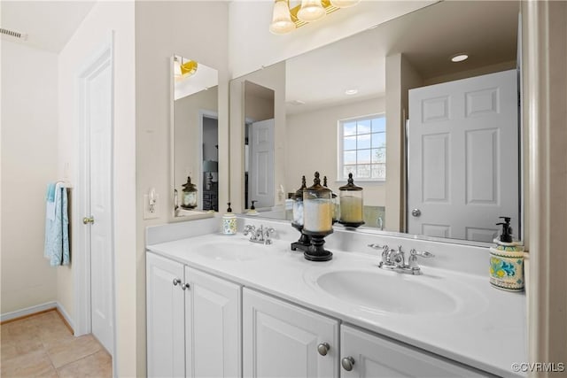 10123 Cool Hive Pl, Mechanicsville, VA 23116 - full bathroom with double vanity, tile patterned flooring, and baseboards