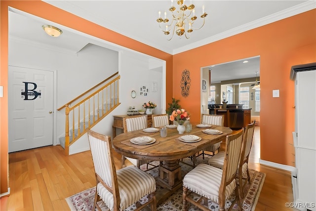 10123 Cool Hive Pl, Mechanicsville, VA 23116 - dining space featuring light wood-style floors, stairway, ornamental molding, a chandelier, and baseboards