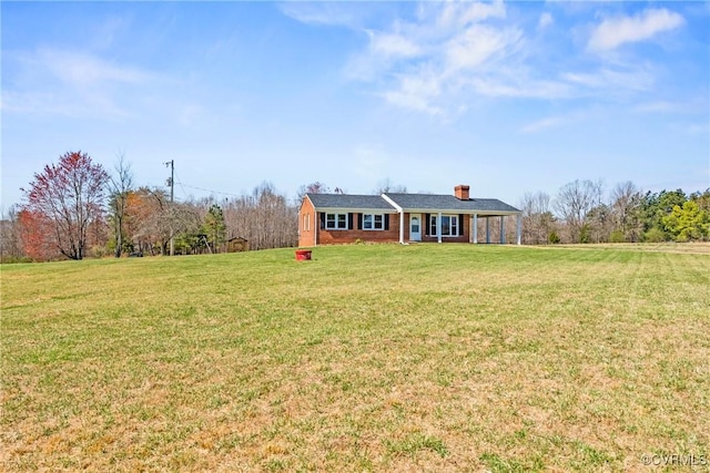 2407 Crawley Rd, Cullen, VA 23924 - ranch-style house featuring a front lawn and a chimney