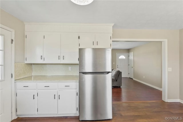 2407 Crawley Rd, Cullen, VA 23924 - kitchen featuring freestanding refrigerator, light countertops, dark wood-style flooring, and white cabinetry