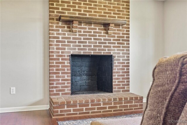 2407 Crawley Rd, Cullen, VA 23924 - interior details featuring baseboards, a fireplace, and wood finished floors