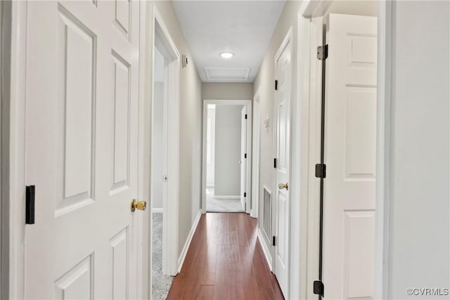 2407 Crawley Rd, Cullen, VA 23924 - hall with baseboards, attic access, and dark wood finished floors
