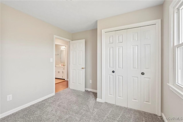 2407 Crawley Rd, Cullen, VA 23924 - unfurnished bedroom featuring baseboards, carpet flooring, and a closet