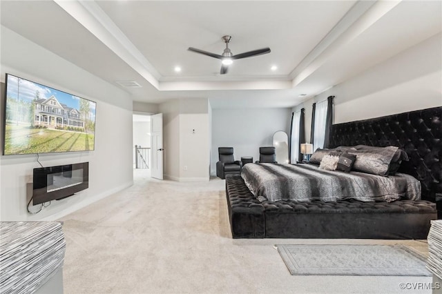bedroom featuring baseboards, carpet, recessed lighting, crown molding, and a raised ceiling