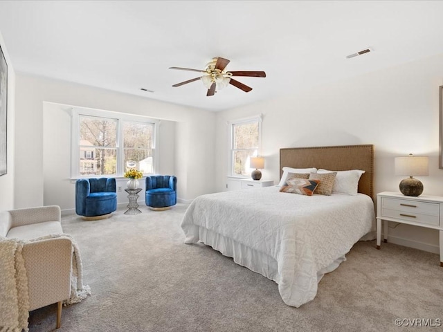 10107 Heritage Ln, Glen Allen, VA 23060 - carpeted bedroom with multiple windows and ceiling fan