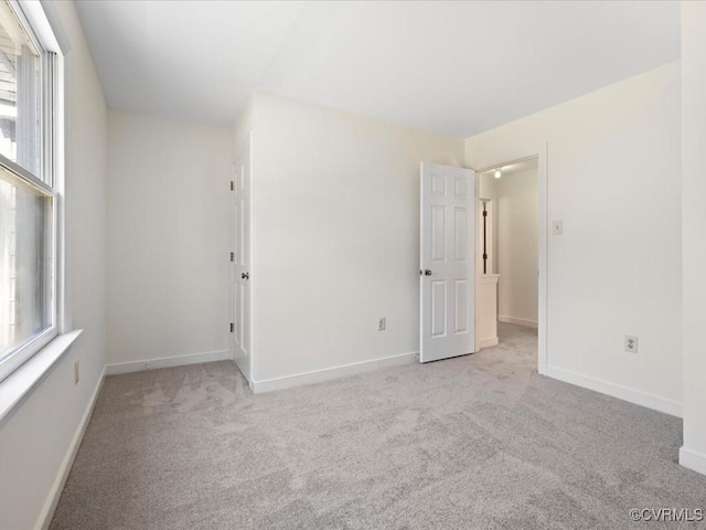 10107 Heritage Ln, Glen Allen, VA 23060 - spare room featuring carpet floors and baseboards
