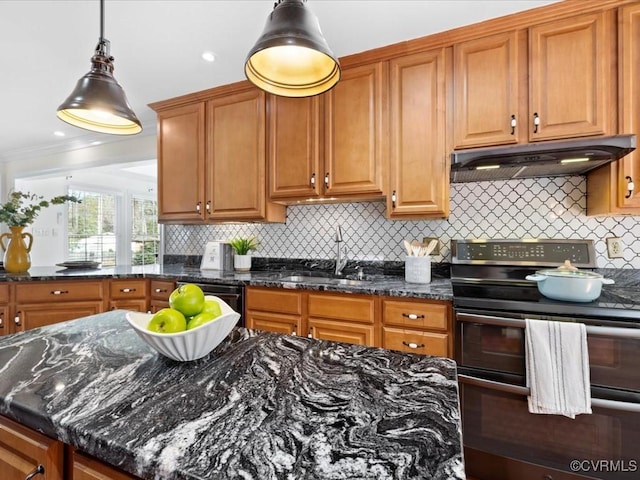 10107 Heritage Ln, Glen Allen, VA 23060 - kitchen with double oven range, under cabinet range hood, dark stone counters, decorative backsplash, and pendant lighting