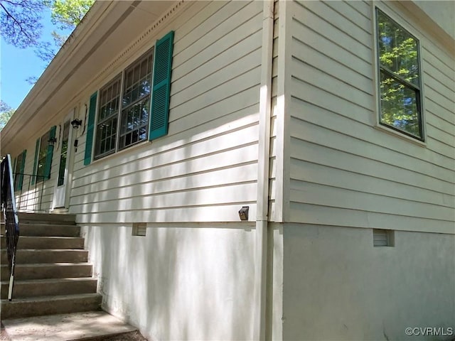 view of home's exterior featuring crawl space
