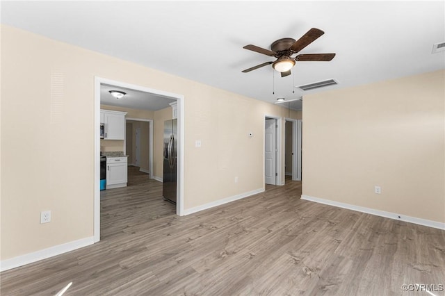 1713 Boydton Plank Rd, Petersburg, VA 23805 - spare room featuring baseboards, visible vents, light wood-style floors, and ceiling fan
