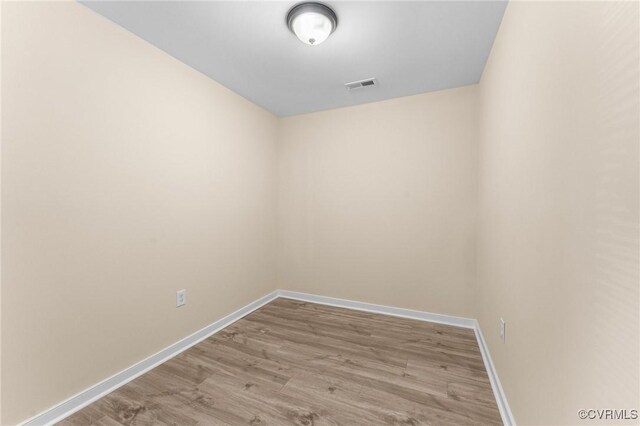 1713 Boydton Plank Rd, Petersburg, VA 23805 - unfurnished room with wood finished floors, baseboards, and visible vents