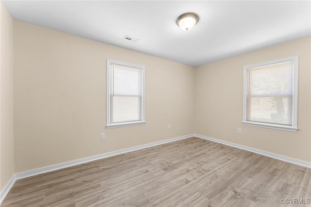 1713 Boydton Plank Rd, Petersburg, VA 23805 - spare room with baseboards, light wood-type flooring, visible vents, and a healthy amount of sunlight